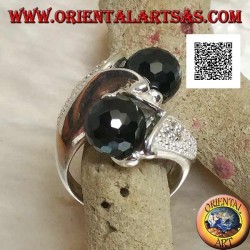 Two-arm rhodium silver ring with two faceted spinel zircon spheres