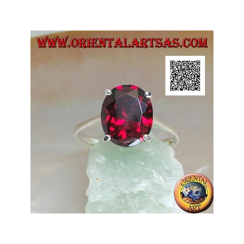 Rhodium silver ring with faceted oval cabochon garnet set with 4 clips