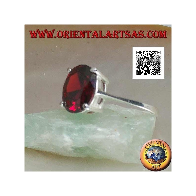 Anillo de plata rodiada con granate cabujón ovalado facetado engastado con 4 clips