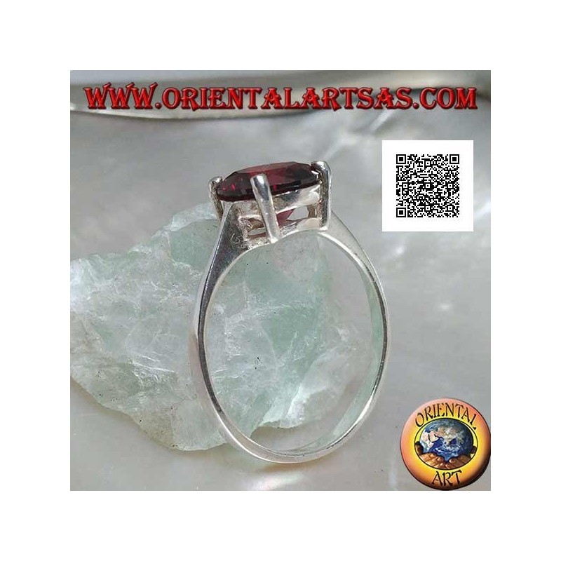 Bague en argent rhodié avec grenat rond facetté serti de 4 clips