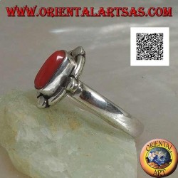 Silver ring with oval natural coral surrounded by alternating bands and discs