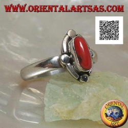 Silver ring with oval natural coral surrounded by alternating bands and discs