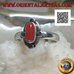 Silver ring with oval natural coral surrounded by alternating bands and discs