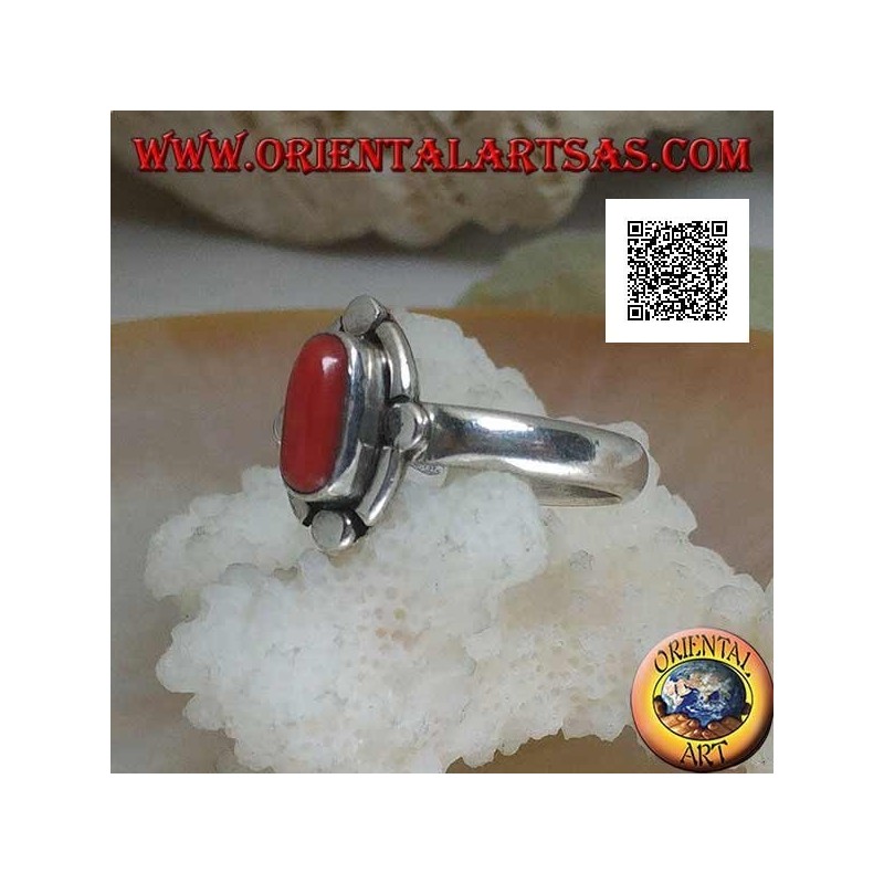 Silver ring with oval natural coral surrounded by alternating bands and discs