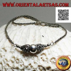 Silver necklace with coiled link with smooth central sphere between two decorated cones