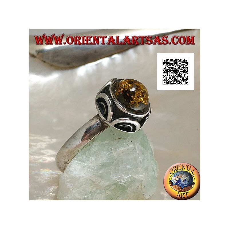 Silver ring with cabochon round green amber surrounded by semicircles in high relief
