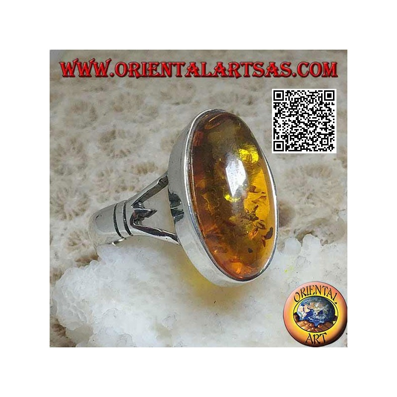 Bague en argent avec un ambre cabochon ovale allongé attaché à deux