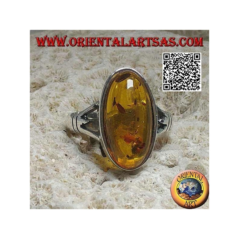 Anillo de plata con un ámbar cabujón ovalado alargado unido a dos