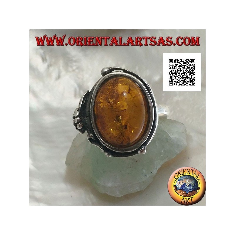 Silberring mit ovalem Cabochon-Bernstein mit zwei Kugeln und einem Blatt am Rand (dünn)