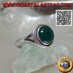 Silver ring with round cabochon green agate surrounded by interlacing attached to two