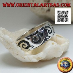 Silver band ring with engraved Maori-Polynesian style wavy designs
