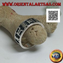 Silver ring with oriental artistic motif in bas relief
