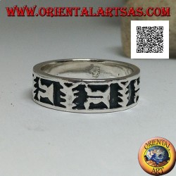 Silver ring with oriental artistic motif in bas relief