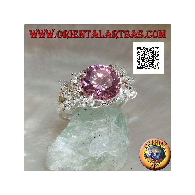 Rhodium silver ring with pink round faceted zircon with side white zircons