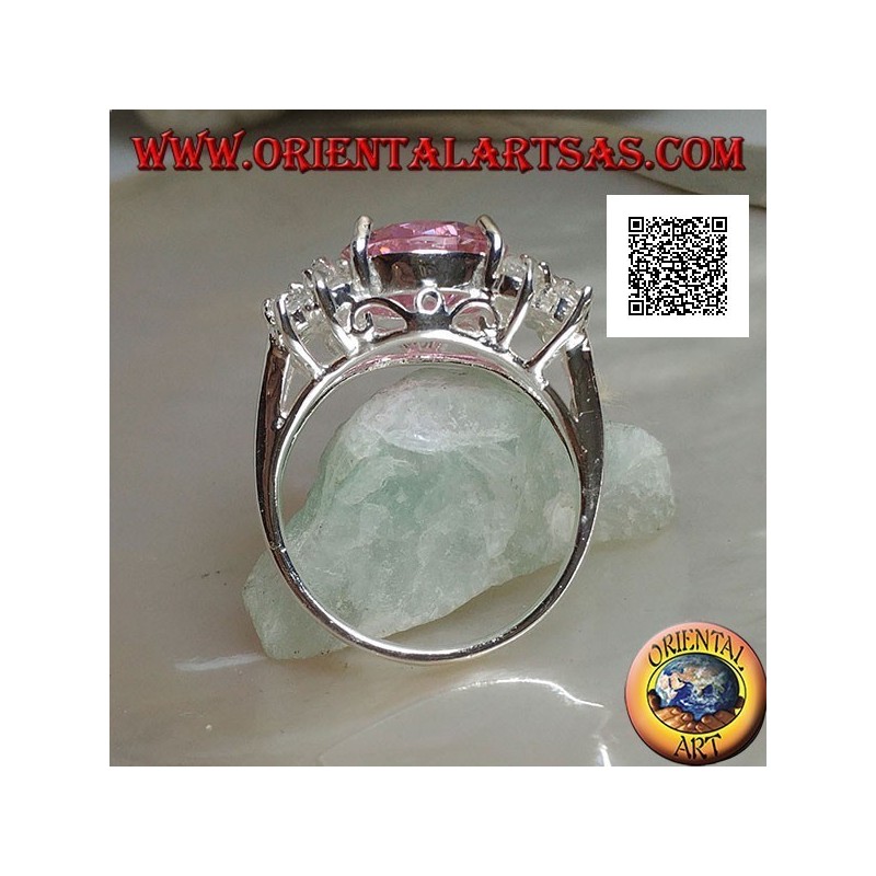Anillo de plata rodiada con circonita redonda facetada rosa con circonitas blancas laterales