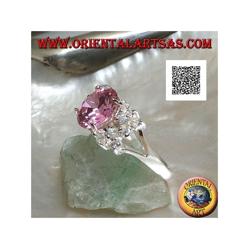 Rhodium silver ring with pink round faceted zircon with side white zircons