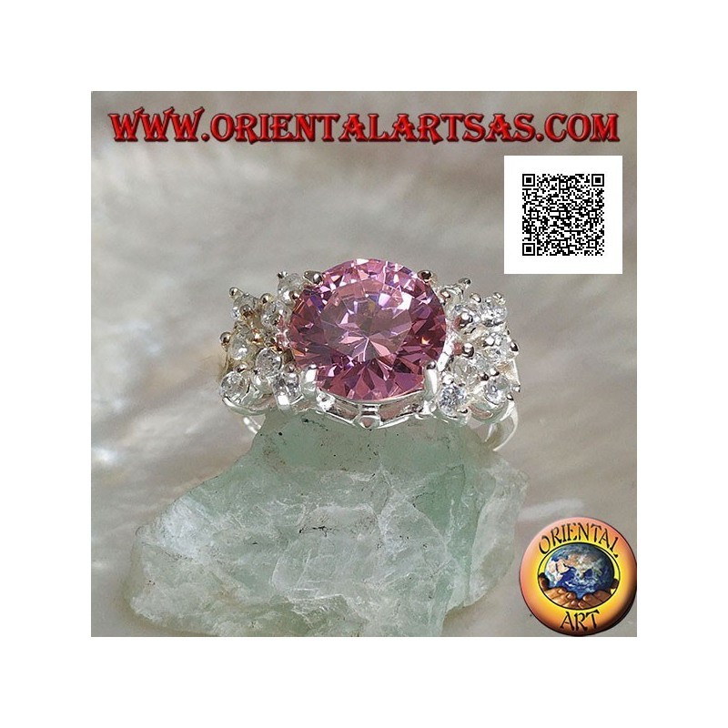 Rhodium silver ring with pink round faceted zircon with side white zircons
