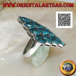Silver ring in the shape of a rhombus formed by 16 oval blue topazes set