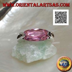 Rhodium silver ring with narrow oval pink faceted zircon hooked on the side