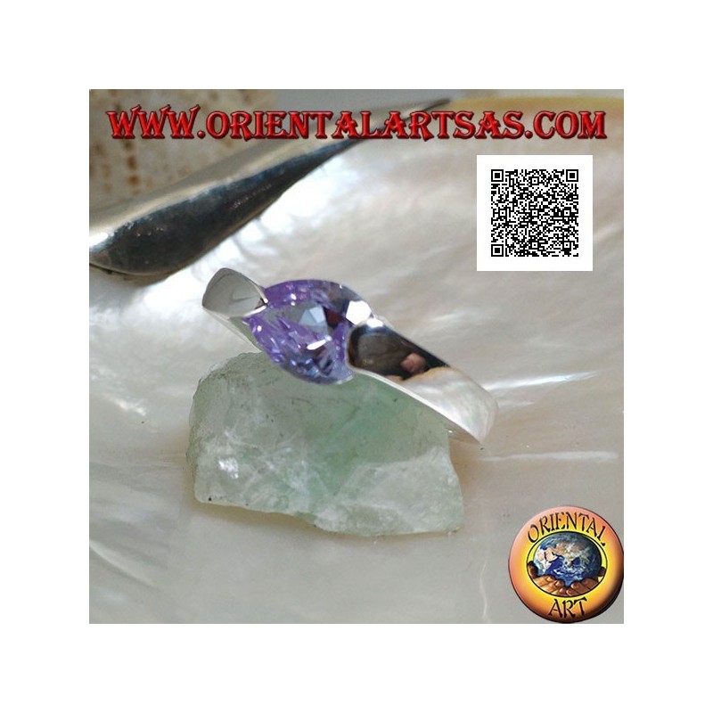 Rhodium-plated silver ring with faceted teardrop amethyst-colored zircon attached to the side