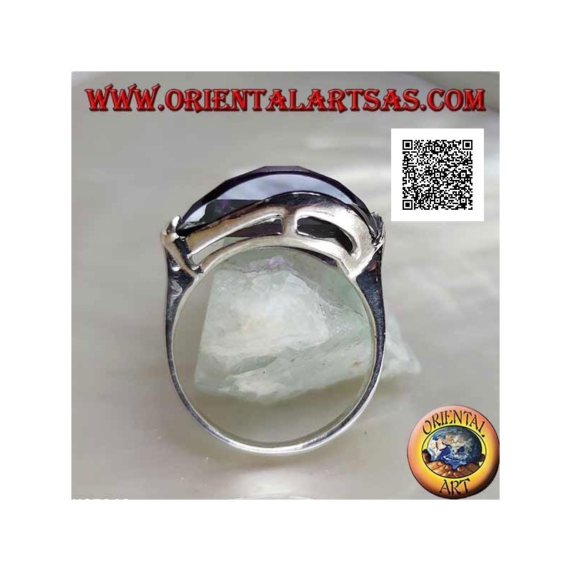 Bague en argent rhodié avec zircon ovale rond de couleur améthyste attaché sur le côté