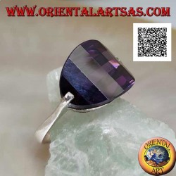 Rhodium-plated silver ring with rounded oval amethyst-colored zircon attached to the side