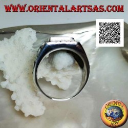 Anillo de plata con turquesa rectangular en relieve y águila en bajorrelieve a los lados