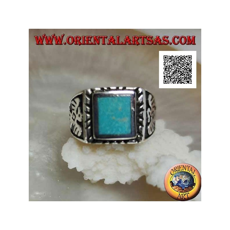 Silver ring with raised rectangular turquoise and bas-relief eagle on the sides