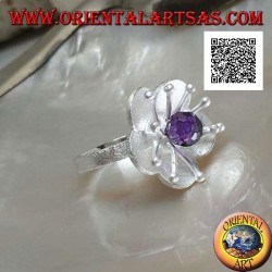 Flower-shaped satin silver ring with long pistils and faceted amethyst-colored zircon sphere