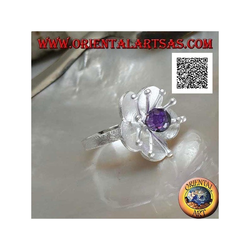 Flower-shaped satin silver ring with long pistils and faceted amethyst-colored zircon sphere