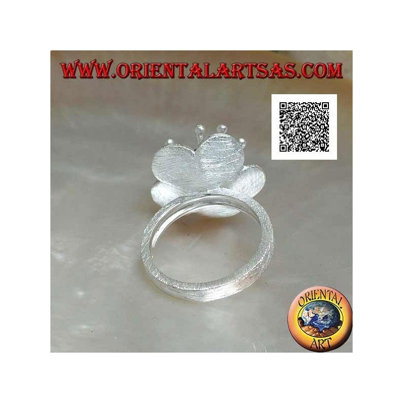 Flower-shaped satin silver ring with long pistils and faceted amethyst-colored zircon sphere