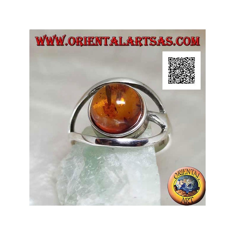 Silver ring with cabochon round amber between two curved lines in silver