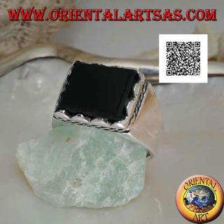 Silver ring with raised rectangular onyx framed and side cord