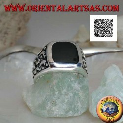 Silver ring with rounded rectangular onyx and moons cut on the sides