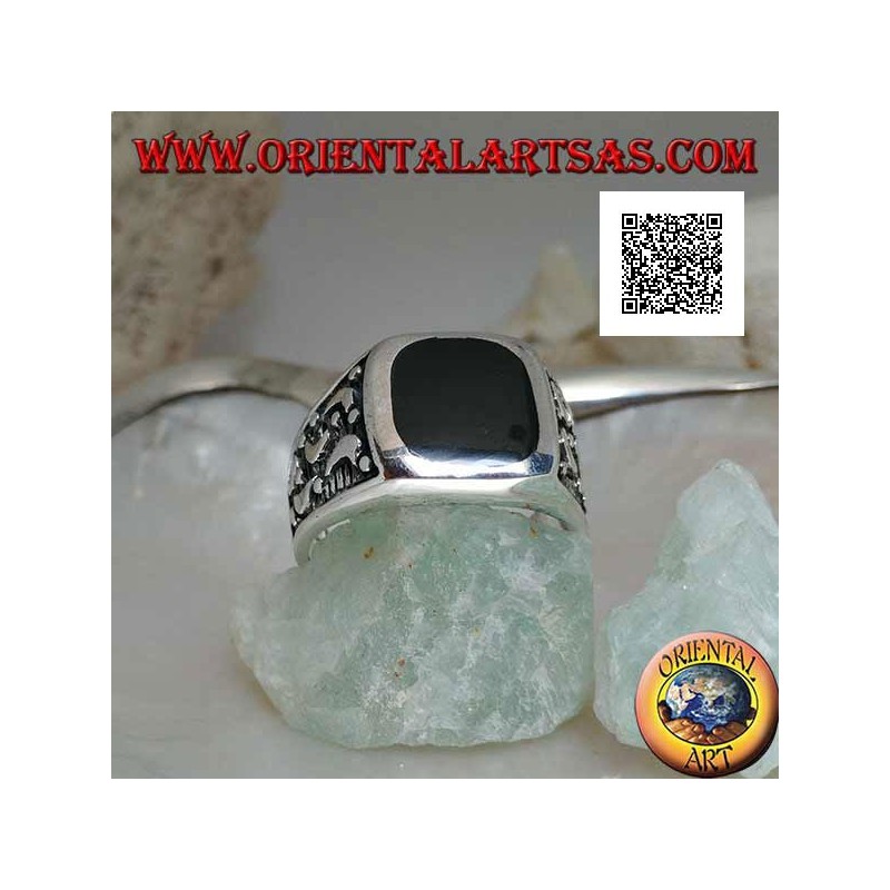 Silver ring with rounded rectangular onyx and moons cut on the sides
