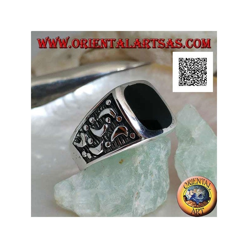 Silver ring with rounded rectangular onyx and moons cut on the sides