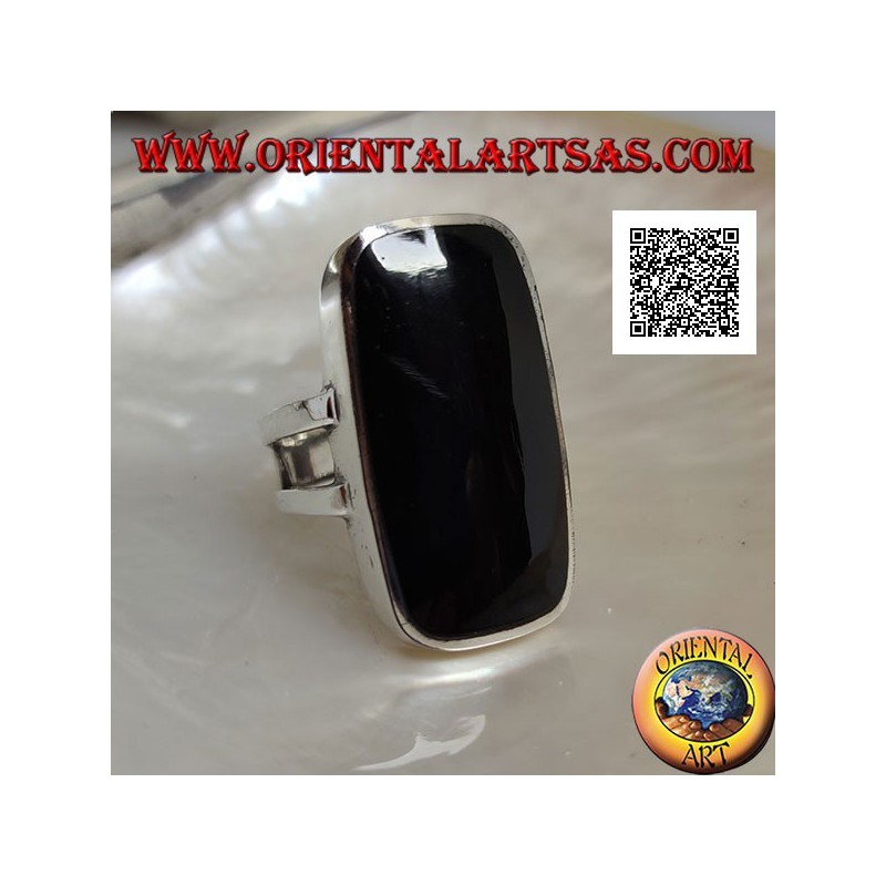 Silver ring with large rectangular beveled onyx on smooth frame with lateral opening