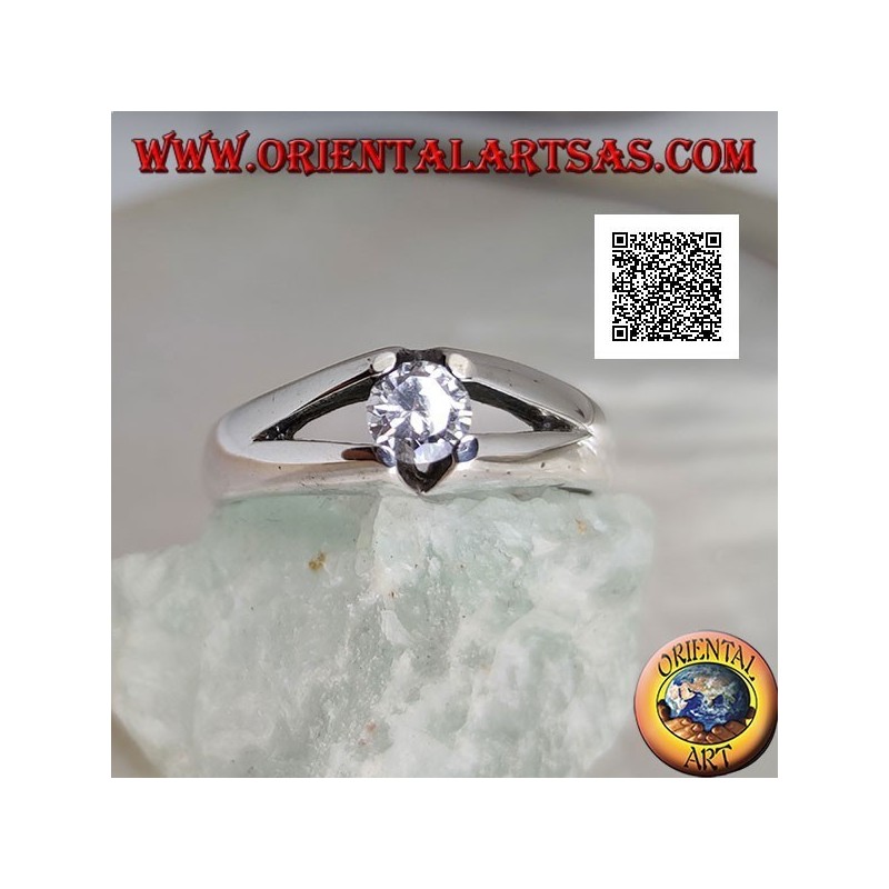 Solitaire silver ring with white round zircon set with four arms and openwork on the sides