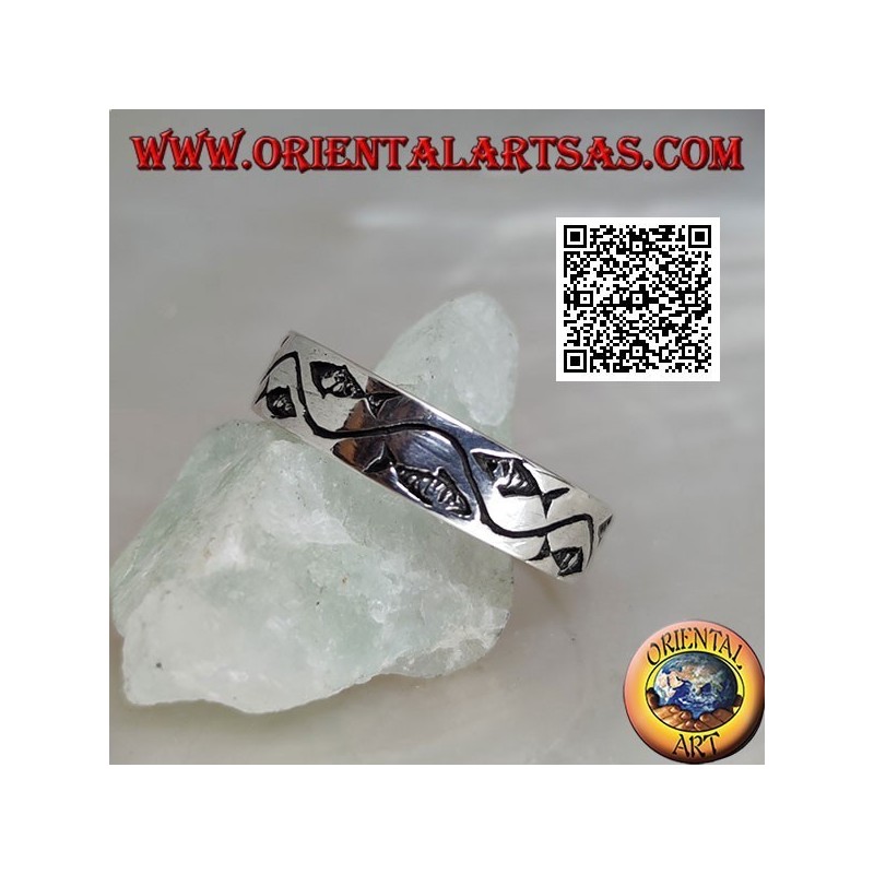 Silver ring with stylized fish separated by a curved line