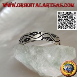 Silver ring with stylized fish separated by a curved line