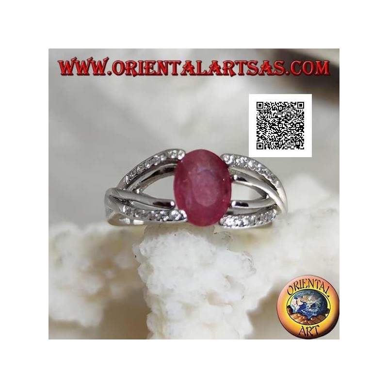 Anello in argento con rubino naturale ovale incastonato da due linee di zirconi e due d'argento