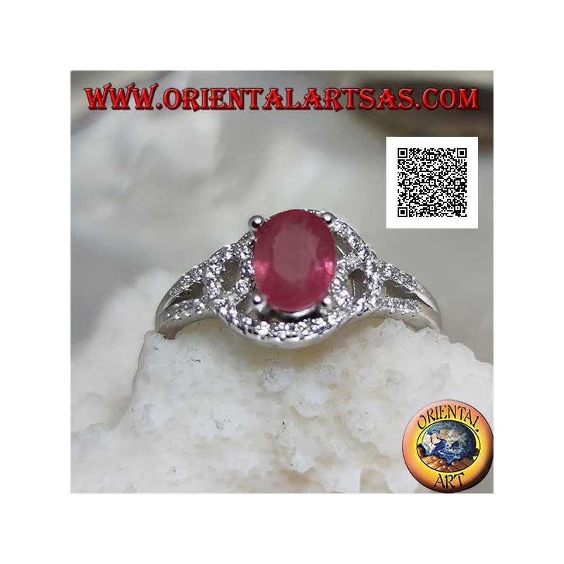 Silver ring with natural oval ruby set on intertwined lines of white zircons