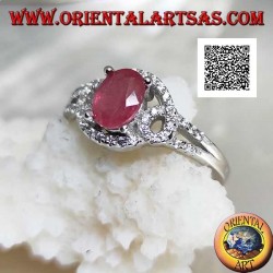 Silver ring with natural oval ruby set on intertwined lines of white zircons