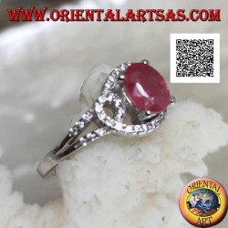 Silver ring with natural oval ruby set on intertwined lines of white zircons