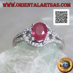 Silver ring with natural oval ruby set on intertwined lines of white zircons