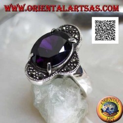 Silver ring with oval amethyst set between four semicircles studded with marcasite