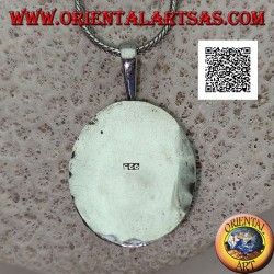 Silver pendant with large oval cabochon carnelian surrounded by trio of balls and studs