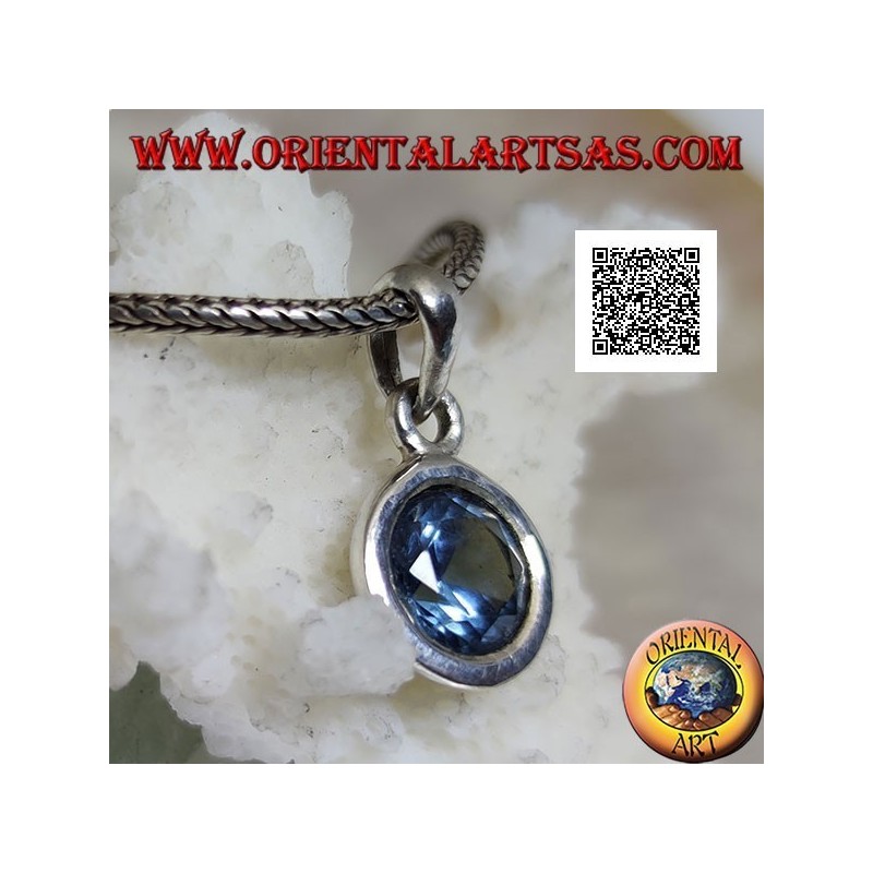 Silver pendant with round diamond-cut blue topaz set flush on a smooth setting