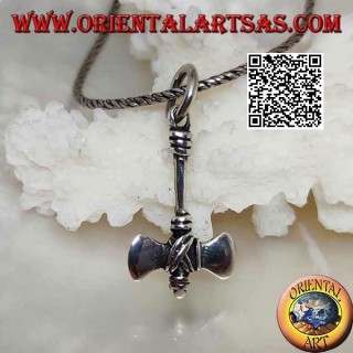 Silver pendant in the shape of a double ax of primitive men