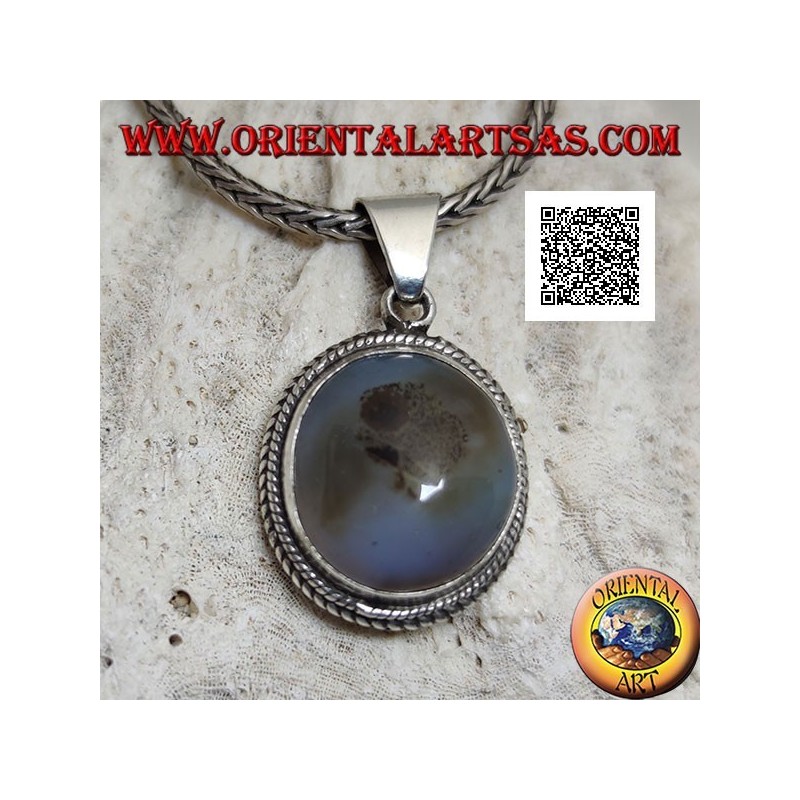Silver pendant with cabochon oval tourmalinated quartz surrounded by weaving